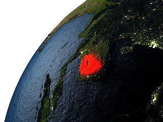 Image showing Cambodia in red on Earth at night