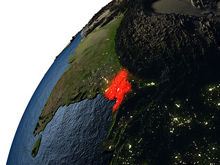 Image showing Bangladesh in red on Earth at night