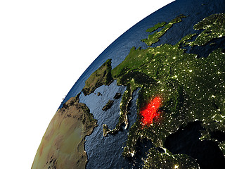 Image showing Serbia in red on Earth at night