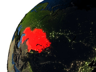 Image showing Kazakhstan in red on Earth at night