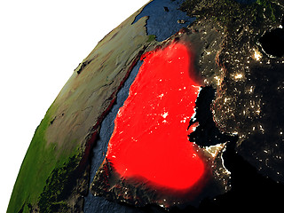 Image showing Saudi Arabia in red on Earth at night