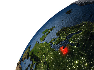 Image showing Latvia in red on Earth at night