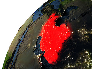 Image showing Iran in red on Earth at night