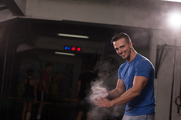 Image showing Gym Chalk Magnesium Carbonate hands clapping man