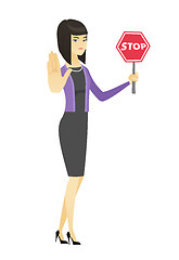 Image showing Asian business woman holding stop road sign.