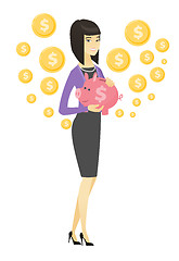 Image showing Asian business woman holding a piggy bank.