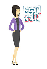 Image showing Business woman looking at labyrinth with solution