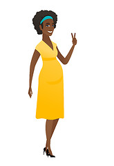 Image showing African pregnant woman showing victory gesture.