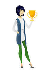 Image showing Asian business woman holding a trophy.