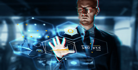 Image showing close up of businessman touching virtual screen