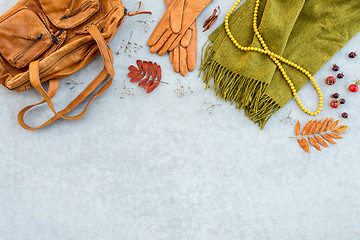 Image showing Autumn fashion flat lay in orange and green tones