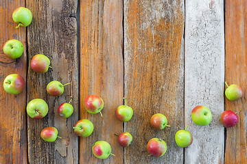 Image showing Apples on rustic wooden background with copy space