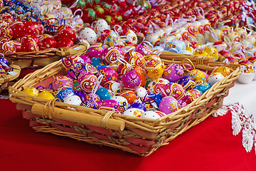 Image showing Easter eggs in a knit wooden basket