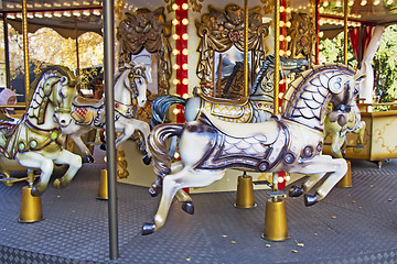 Image showing Old fashioned french carousel with horses