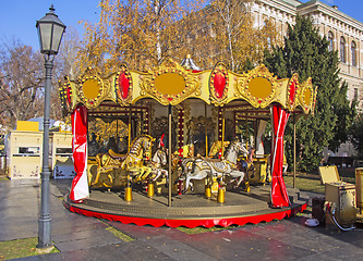 Image showing Old fashioned french carousel with horses