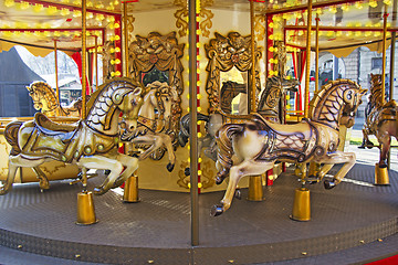 Image showing Old fashioned french carousel with horses