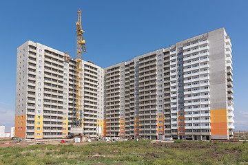 Image showing Construction of a typical sixteen-story block house