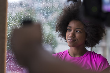 Image showing african american woman using tablet