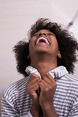 Image showing beautiful black woman wearing  bathrobe