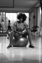 Image showing woman  relaxing after pilates workout