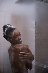 Image showing African American woman in the shower