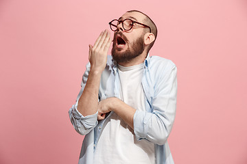 Image showing Beautiful bored man bored isolated on pink background