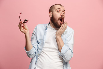 Image showing Beautiful bored man bored isolated on pink background