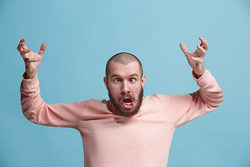 Image showing Handsome man in stress isolated on blue