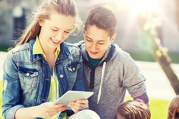 Image showing group of students with tablet pc at school yard