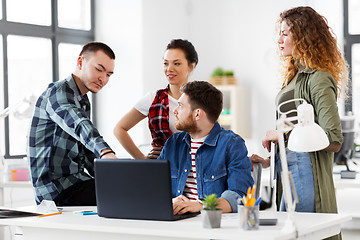 Image showing creative team with laptop working at office