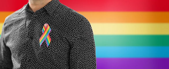 Image showing man with gay pride rainbow awareness ribbon