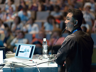 Image showing Public speaker giving talk at Business Event.