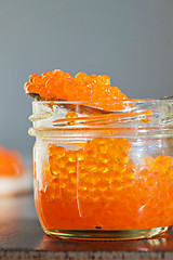 Image showing Macro shot of red caviar on jar