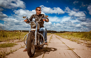 Image showing Biker on a motorcycle