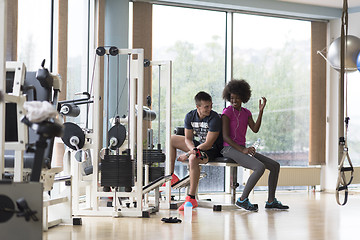 Image showing couple in a gym have break