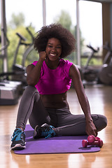 Image showing african american woman exercise yoga in gym