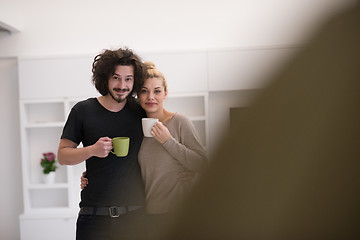 Image showing Happy couple in their new home