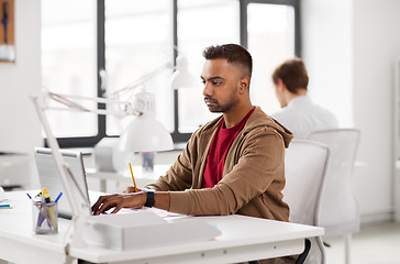 Image showing indian man with laptop computer at office