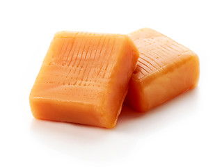 Image showing caramel pieces on white background