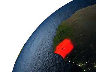 Image showing Ivory Coast in red on Earth at night