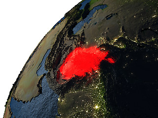 Image showing Afghanistan in red on Earth at night