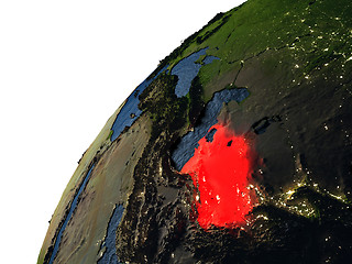 Image showing Turkmenistan in red on Earth at night