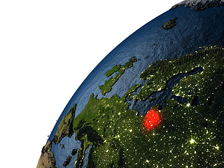 Image showing Lithuania in red on Earth at night