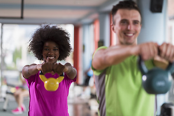 Image showing couple  workout with weights at  crossfit gym