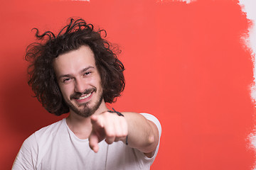 Image showing young man with funny hair over color background