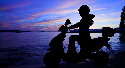 Image showing scooter and sunset