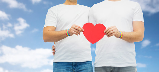 Image showing couple with gay pride rainbow wristbands and heart