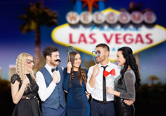 Image showing happy friends with party props in las vegas