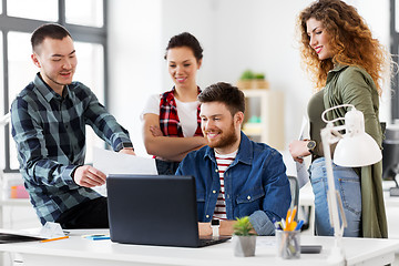 Image showing creative team with laptop working at office