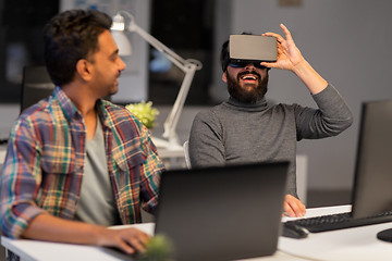 Image showing creative man in virtual reality headset at office